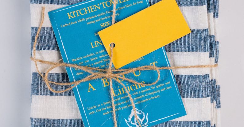 Linen Napkins - Blue Card on Blue and White Textile