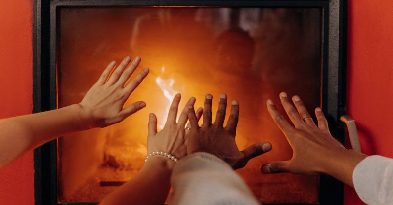 Fireplace - Couples Hands By Fireplace