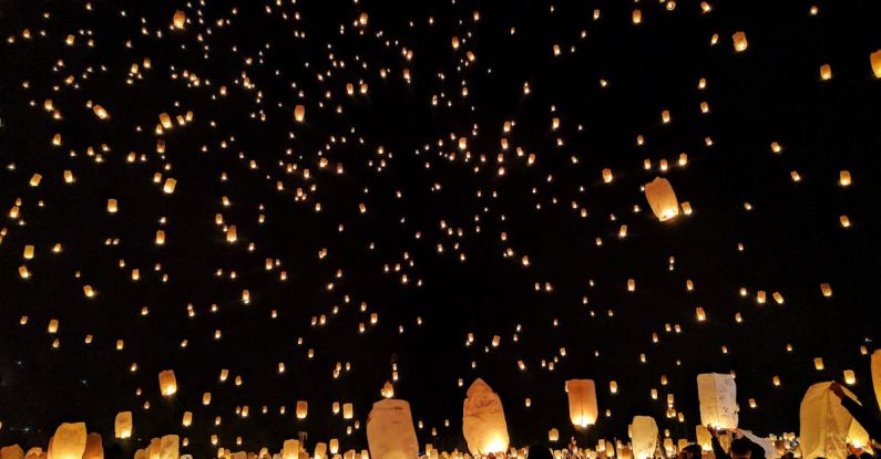 Lanterns - Group of People Throwing Paper Lantern on Sky during Night
