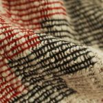 Rugs - White, Black, and Red Textile