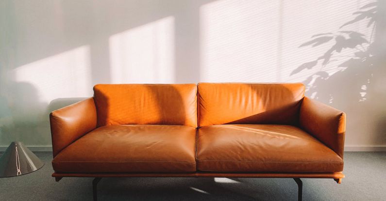 Sofas - 2-seat Orange Leather Sofa Beside Wall
