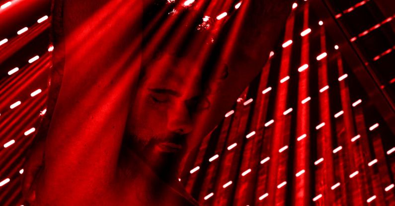 Red - Abstract Photograph of a Man with Bare Torso in Red Light